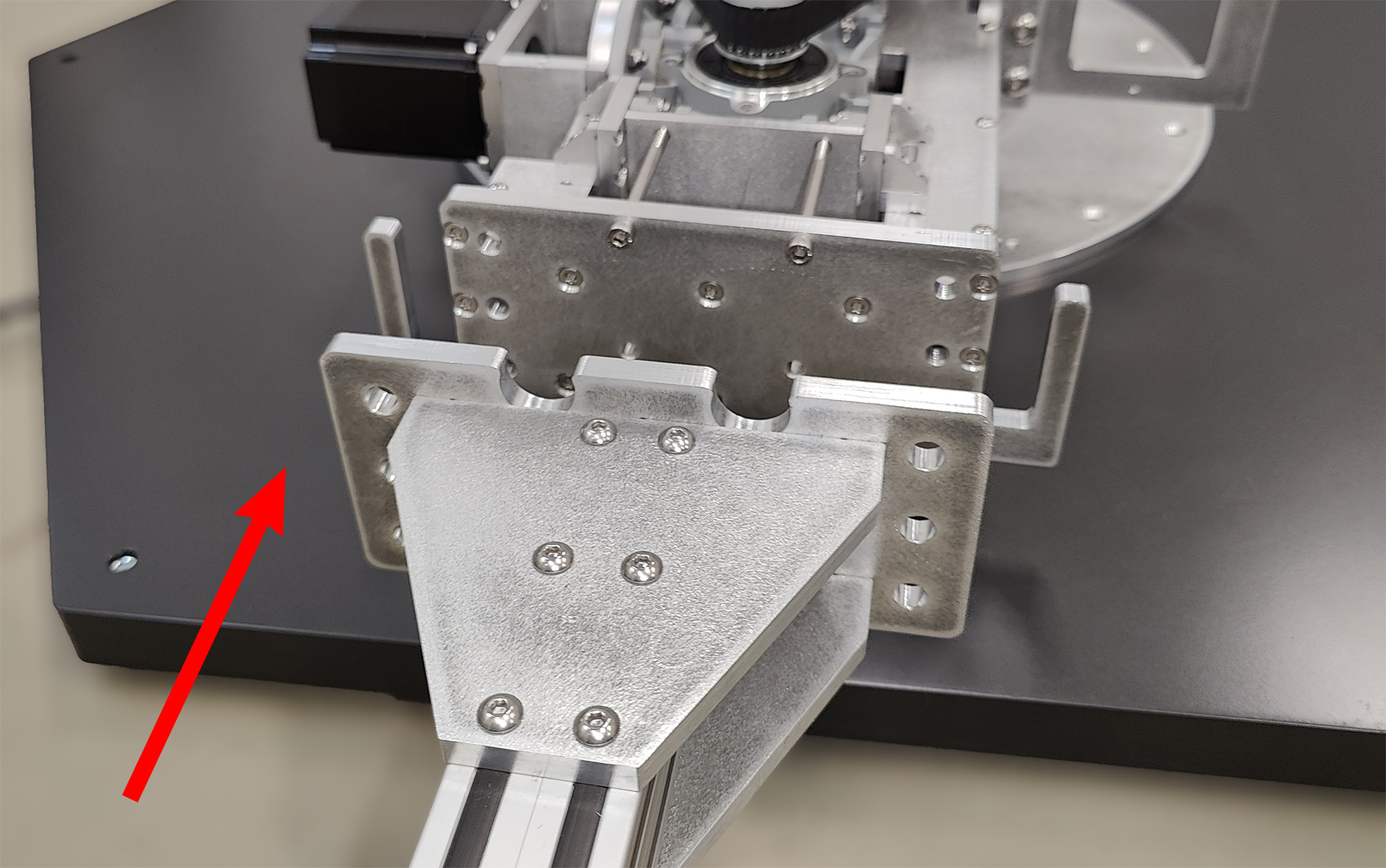 Laptop stand beam flange and mounting location