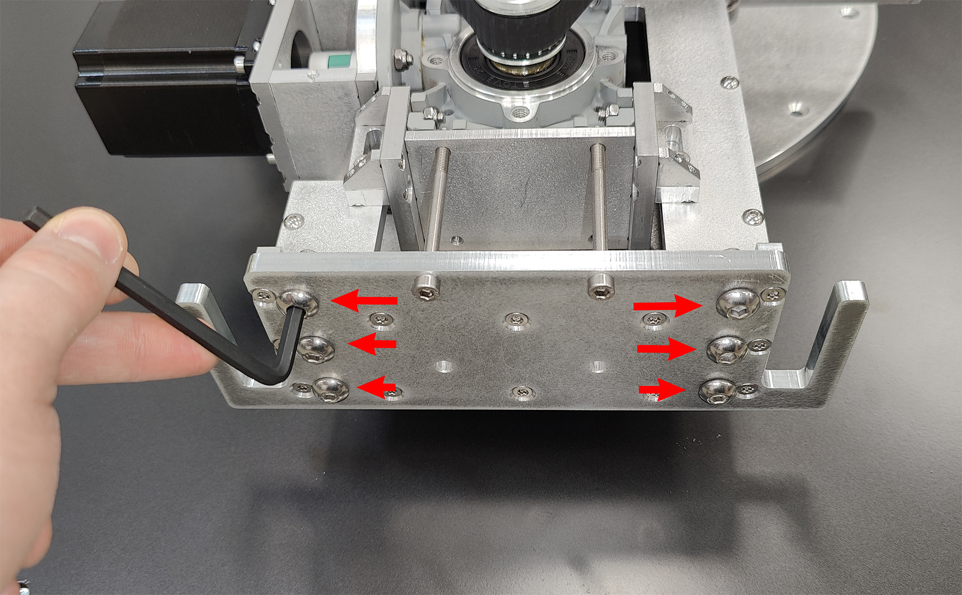 Laptop stand beam mounting screws